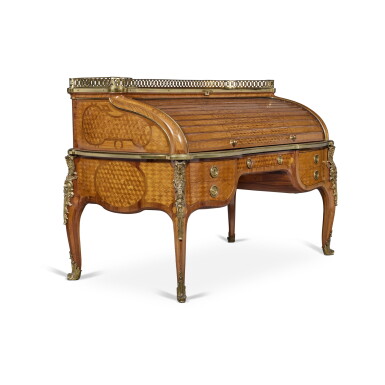 View full screen - View 1 of Lot 63. A Louis XV/XVI Transitional Style Gilt-Bronze Mounted Tulipwood and Amaranth Bureau à Cylindre, after the model by Jean-Francois Oeben, Late 19th Century .
