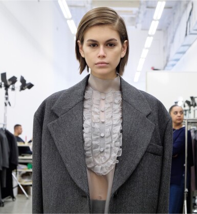 View full screen - View 1 of Lot 3. PRADA | SHEER SILK ORGANZA DRESS, FRINGED WOOL COAT WORN BY KAIA GERBER.