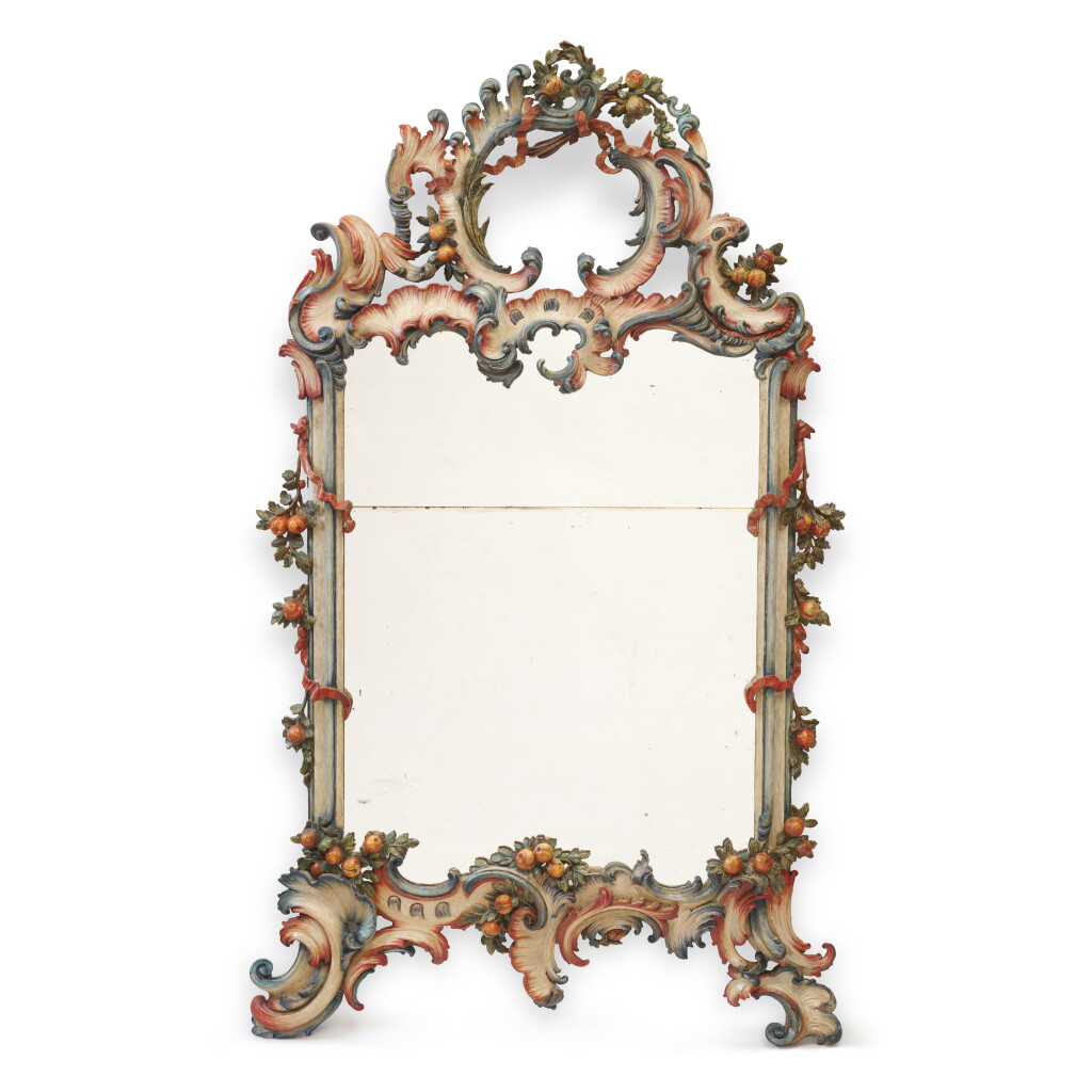 View full screen - View 1 of Lot 32. A polychrome painted wood mirror, South Germany, circa 1760, after designs by Franz-Xaver Habermann (1721-1796) and Georg Michel Roscher (1727-1775).