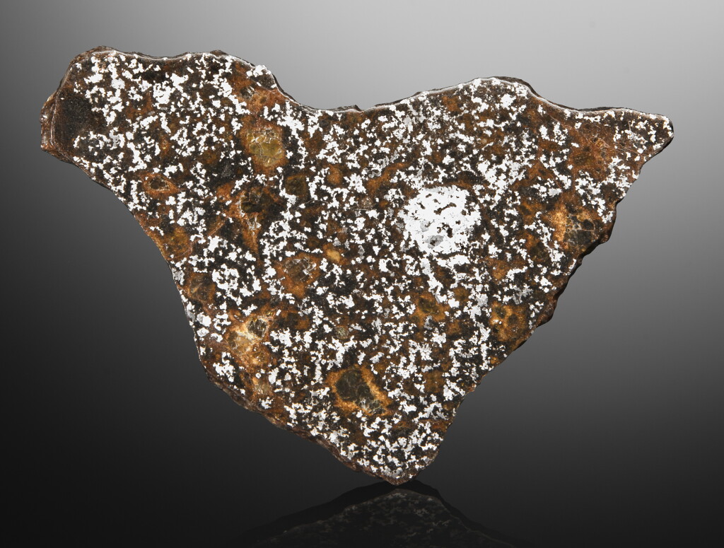 View full screen - View 1 of Lot 115. Tibuktu Meteorite | Rare Complete Slice Of Timbuktu.