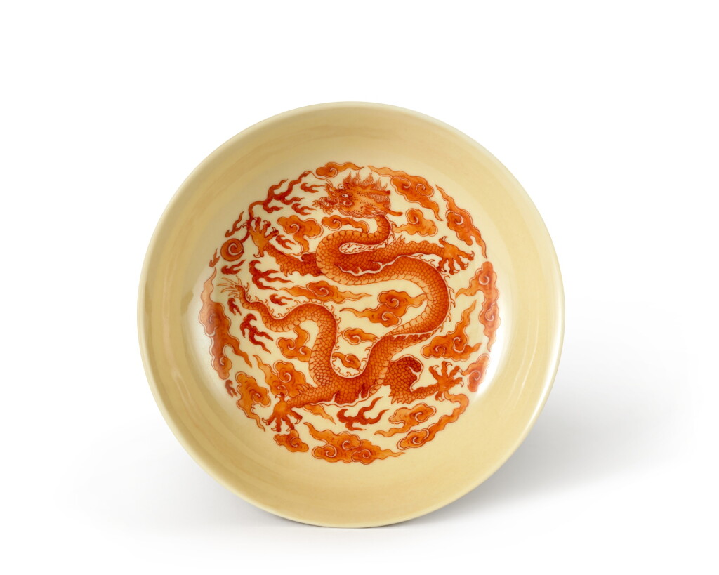 View full screen - View 1 of Lot 3628. An extremely rare café-au-lait ground and iron-red decorated 'dragon' dish, Mark and period of Yongzheng | 清雍正 米黃地礬紅彩雲龍紋盤 《大清雍正年製》款.