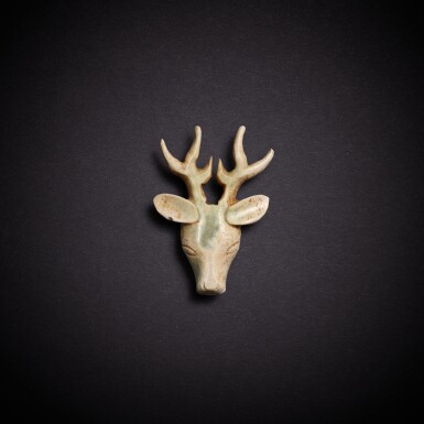 View full screen - View 1 of Lot 7861. A celadon jade deer head, Western Zhou dynasty | 西周 青玉鹿首.
