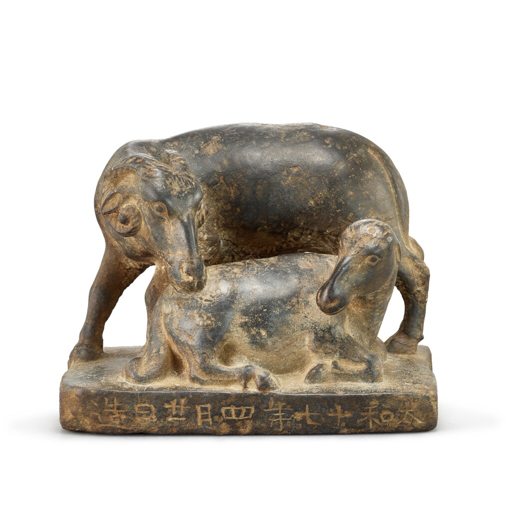 View full screen - View 1 of Lot 2053. An inscribed stone 'ram' group, 20th century 二十世紀 灰石雕子母羊擺件 「太和十七年四月廿日造」字.
