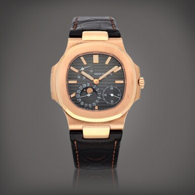 View full screen - View 1 of Lot 411. Nautilus 'Geneva Seal', Reference 5712R-001 | A pink gold wristwatch with moon phases, date and power reserve indication | Circa 2009.