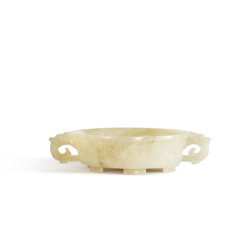 View full screen - View 1 of Lot 154. A white jade washer, 20th century.