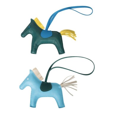 View full screen - View 1 of Lot 13. Hermès Set of Two Grigri Rodeo Bag Charms Size MM.