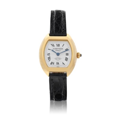 View full screen - View 1 of Lot 9255. Cartier | Tortue Tonneau, Reference 1945, A yellow gold wristwatch, Circa 1990 | 卡地亞 | Tortue Tonneau 型號1945 黃金腕錶,約1990年製.
