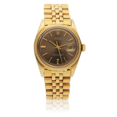 View full screen - View 1 of Lot 131. ROLEX | DATEJUST, REF 1601 YELLOW GOLD WRISTWATCH WITH DATE AND BRACELET CIRCA 1977.