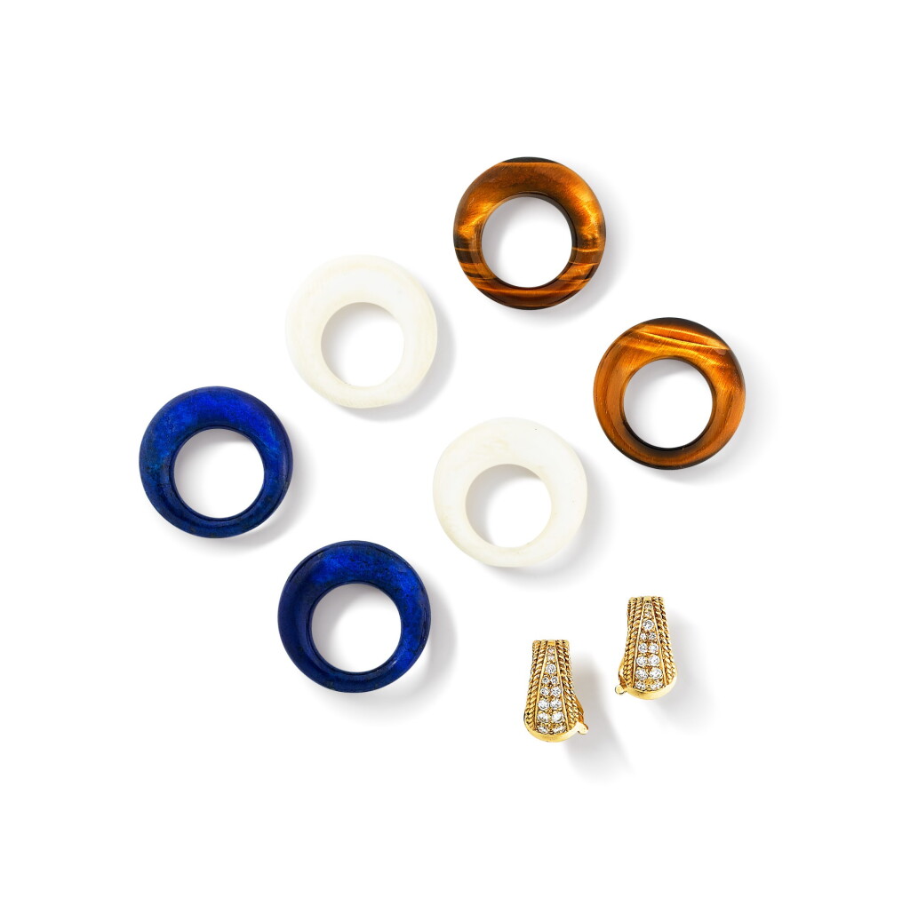 View full screen - View 1 of Lot 79. Van Cleef & Arpels | Paire de clips d'oreille lapis-lazuli, ivoire, quartz œil-de-tigre et diamants | Pair of lapis lazuli, ivory, tiger's-eye-quartz and diamond ear clips.