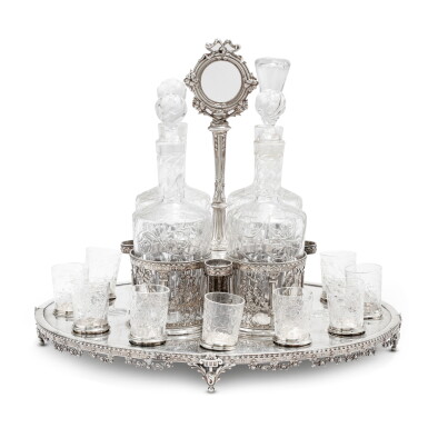 View full screen - View 1 of Lot 390. A Louis XVI style silver and cut glass liquor cabinet, probably Paul Canaux & Cie, Paris, 1892-1911 | Cabaret à liqueurs de style Louis XVI en argent et verre taillé probablement par Paul Canaux & Cie, Paris, 1892-1911.