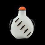 A black-overlay glass 'mask handles' snuff bottle, Qing dynasty, 19th century | 清十九世紀 涅白地套黑料鋪首鼻煙壺