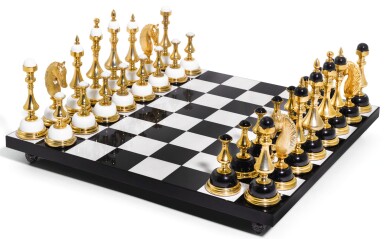 View full screen - View 1 of Lot 59. A MODERN GILT-BRASS HARDSTONE CHESS SET.