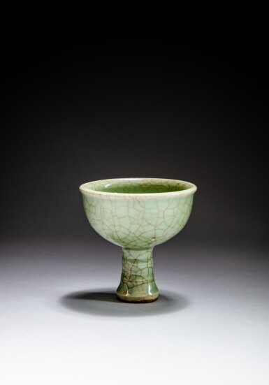 View full screen - View 1 of Lot 32. A crackled celadon-glazed stemcup, Ming dynasty | 明 青釉高足盃.