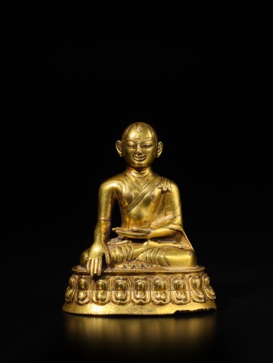 View full screen - View 1 of Lot 128. A gilt-copper alloy figure of Jigten Sumgon Rinchen Pel, Tibet, 13th century.