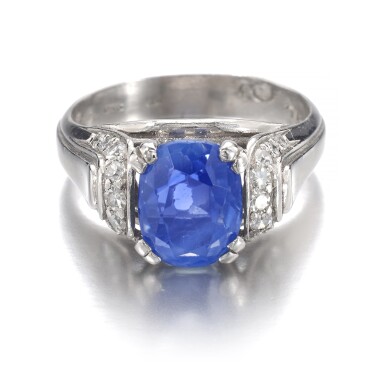 View full screen - View 1 of Lot 1015. Sapphire and diamond ring.