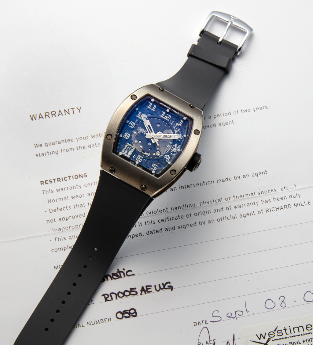 View full screen - View 1 of Lot 123. Reference RM005 AE WG | A white gold skeletonized wristwatch with date, Circa 2004 | Richard Mille RM005 AE WG | 型號白金鏤空腕錶備日期顯示,約2004年製.