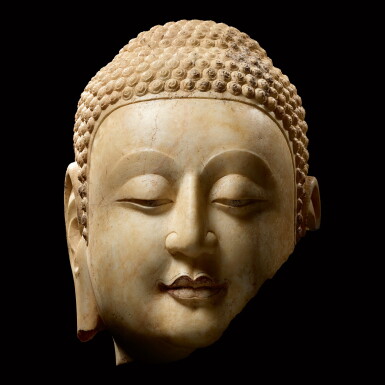 View full screen - View 1 of Lot 5. A superbly carved rare marble fragmentary head of Shakyamuni Buddha Northern Qi dynasty | 北齊 大理石釋迦牟尼佛首.