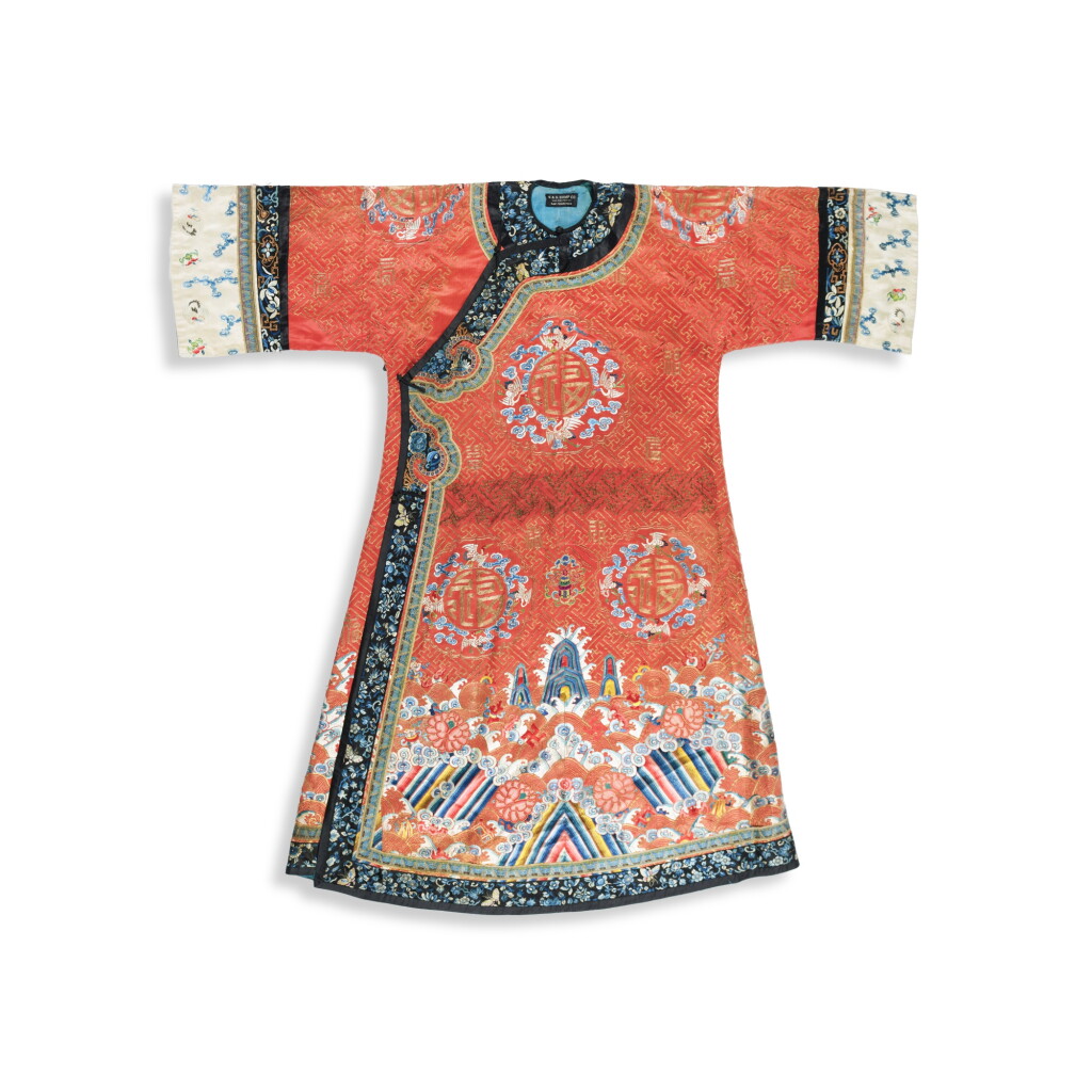 View full screen - View 1 of Lot 1316. A red-ground silk embroidered lady's robe, Qing dynasty, 19th century | 清十九世紀 紅地繡瑞鶴團紋袍.