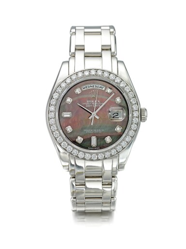 View full screen - View 1 of Lot 19. ROLEX | REFERENCE 18946 DAY-DATE MASTERPIECE A PLATINUM AND DIAMOND-SET AUTOMATIC WRISTWATCH WITH DAY, DATE AND MOTHER OF PEARL DIAL, CIRCA 2000.