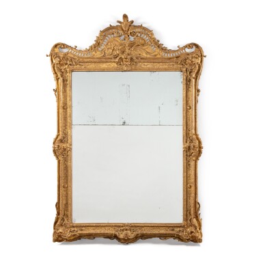 View full screen - View 1 of Lot 431. A Régence giltwood mirror, circa 1720, in the manner of Nicolas Pineau | Miroir en bois doré d'époque Régence, vers 1720, dans le style de Nicolas Pineau .