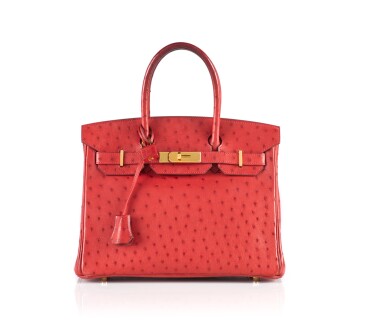 View full screen - View 1 of Lot 1. BIRKIN 30 OSTRICH LEATHER IN ROUGE VIF COLOUR WITH GOLD HARDWARE. HERMÈS, 2016.