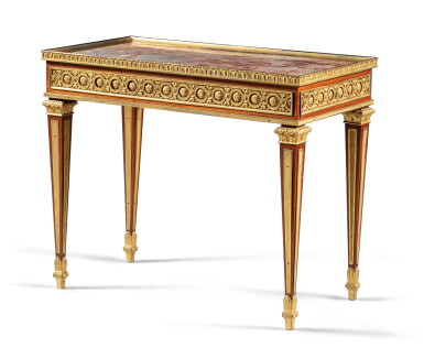 View full screen - View 1 of Lot 317. A Louis XVI gilt-bronze mounted, tulipwood and amaranth veneered cabaret table, attributed to Jean-François Leleu | Table en cabaret en placage de bois de rose et amarante, monture de bronze doré d’époque Louis XVI, attribuée à Jean-François Leleu.