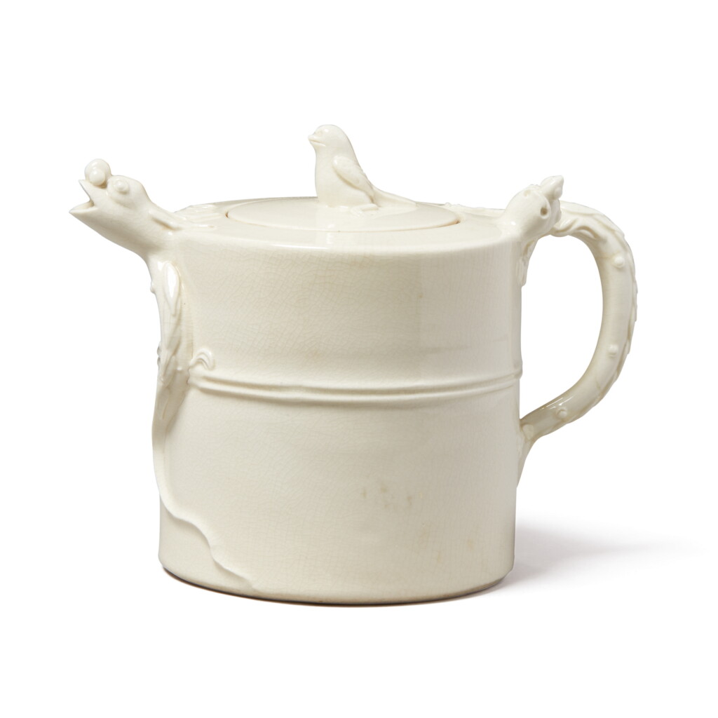 View full screen - View 1 of Lot 1042. A WHITE-GLAZED 'CHILONG' TEAPOT AND COVER, QING DYNASTY, 18TH / 19TH CENTURY.