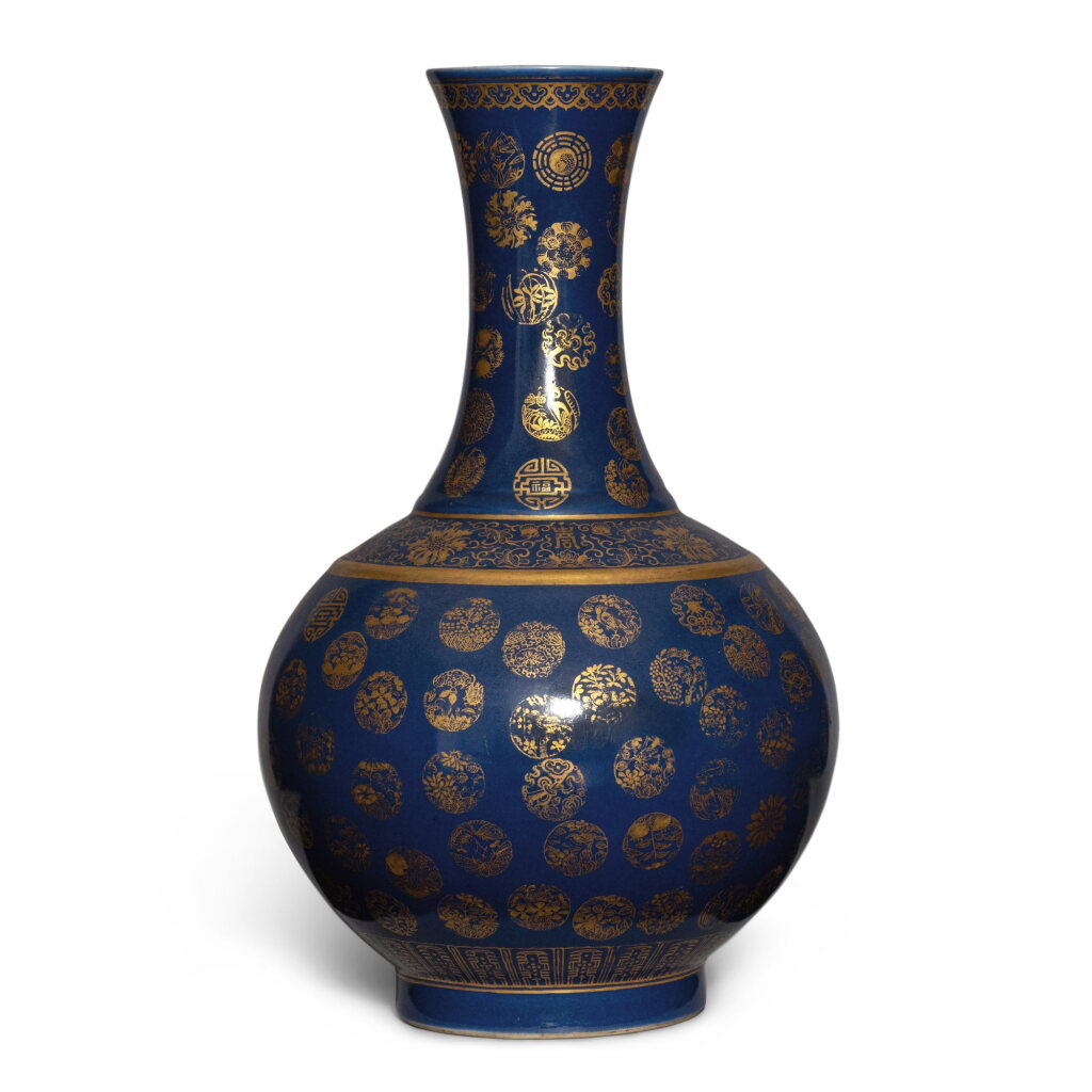 View full screen - View 1 of Lot 8. A powder-blue-ground gilt-decorated bottle vase, Mark and period of Guangxu | 清光緒 灑藍地描金團花紋賞瓶 《大清光緒年製》款.