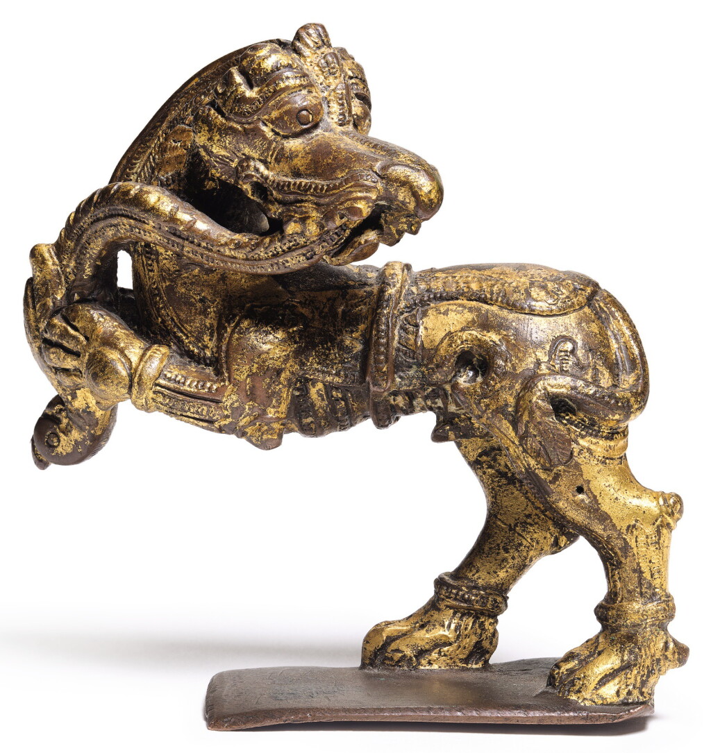 View full screen - View 1 of Lot 259. A BRONZE CAST SCULPTURE DEPICTING TWO MYTHICAL ANIMALS IN COMBAT, INDIA, DECCAN, BIJAPUR OR GOLCONDA, 17TH CENTURY.