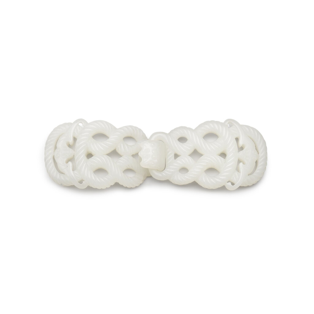 View full screen - View 1 of Lot 42. A white jade belt buckle, Qing dynasty, 18th century | 清十八世紀 白玉索紋帶扣.