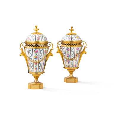 View full screen - View 1 of Lot 186. A pair of Louis XVI gilt-bronze mounted Sèvres pot-pourri vases with covers, circa 1780 | Paire de vases couverts pots pourri en porcelaine de Sèvres et bronze doré d'époque Louis XVI, vers 1780.