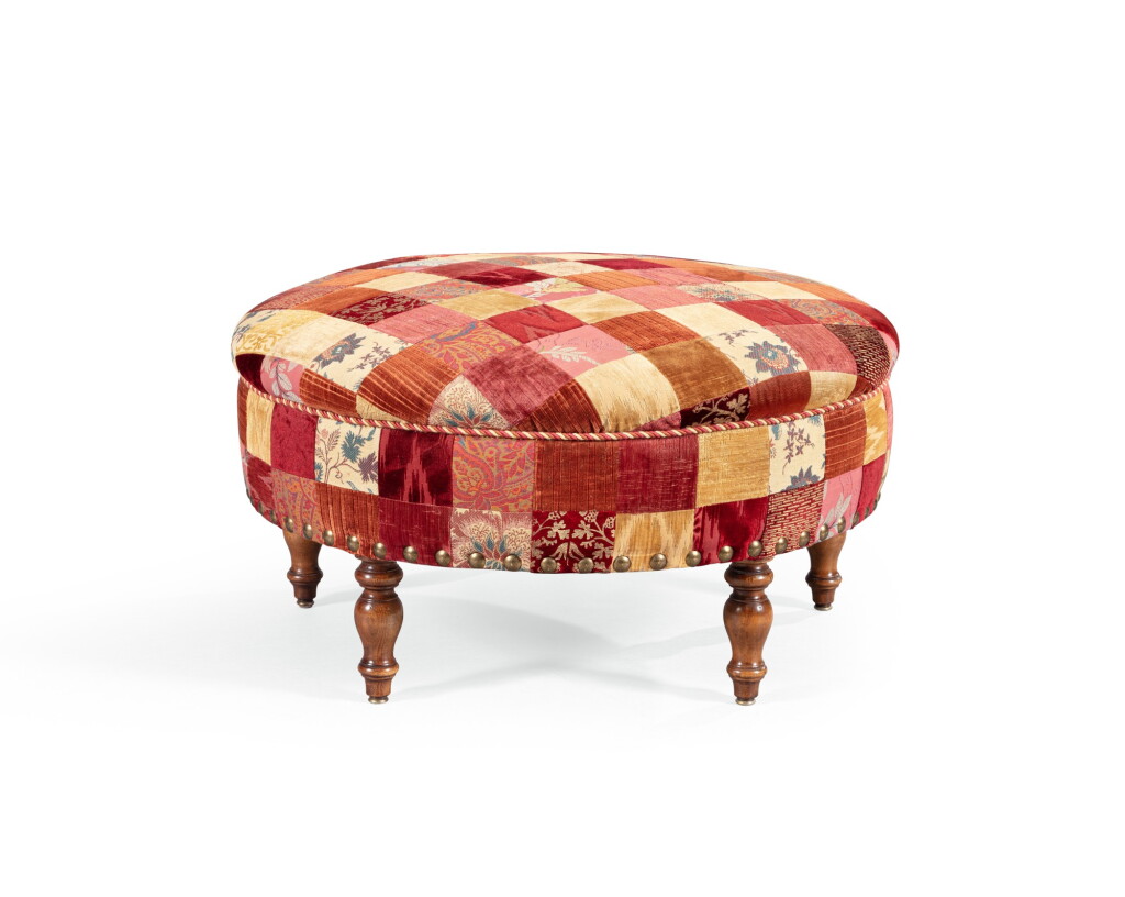 View full screen - View 1 of Lot 5. A circular pouf covered in patchwork fabric, modern, in the manner of Renzo Mongiardino | Pouf circulaire garni d'un patchwork de différents tissus reposant sur des pieds en bois tourné, dans le goût de Renzo Mongiardino.