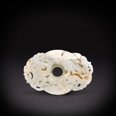 View full screen - View 1 of Lot 6911. A white jade archaistic 'chilong' plaque, Qing dynasty | 清 白玉仿古螭龍紋璧.