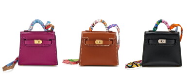 View full screen - View 1 of Lot 61. Set of 3 Micro Mini Kelly Twilly Bag Charms: Anemone Tadelakt Gold Hardware, 2021, Fauve Barenia Tadelakt Gold Hardware, 2021, Black Tadelakt Mini Kelly Twilly Bag Charm Palladium Hardware, 2022.