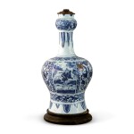 A DUTCH DELFT BLUE AND WHITE BOTTLE VASE, CIRCA 1700