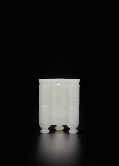 View full screen - View 1 of Lot 465. An archaistic white jade scroll-form tripod vessel, Qing dynasty, Qianlong period | 清乾隆 白玉仿古紋三足尊.