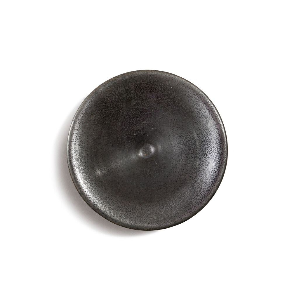 View full screen - View 1 of Lot 706. A large black-glazed 'oil spot' bowl, Jin dynasty | 金 黑釉油滴大笠式盌.