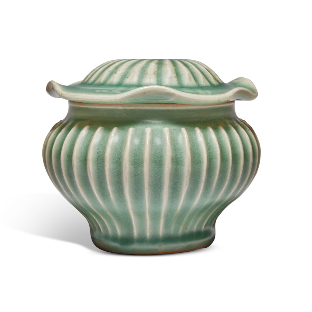 View full screen - View 1 of Lot 56. A small 'Longquan' celadon-glazed ribbed jar and cover, Yuan dynasty.