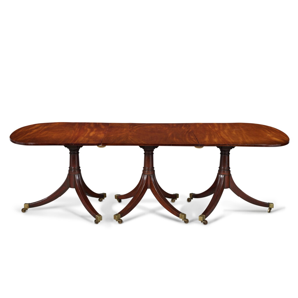 View full screen - View 1 of Lot 534. A Late Regency Mahogany Three Pedestal Extending Dining Table, Circa 1830.
