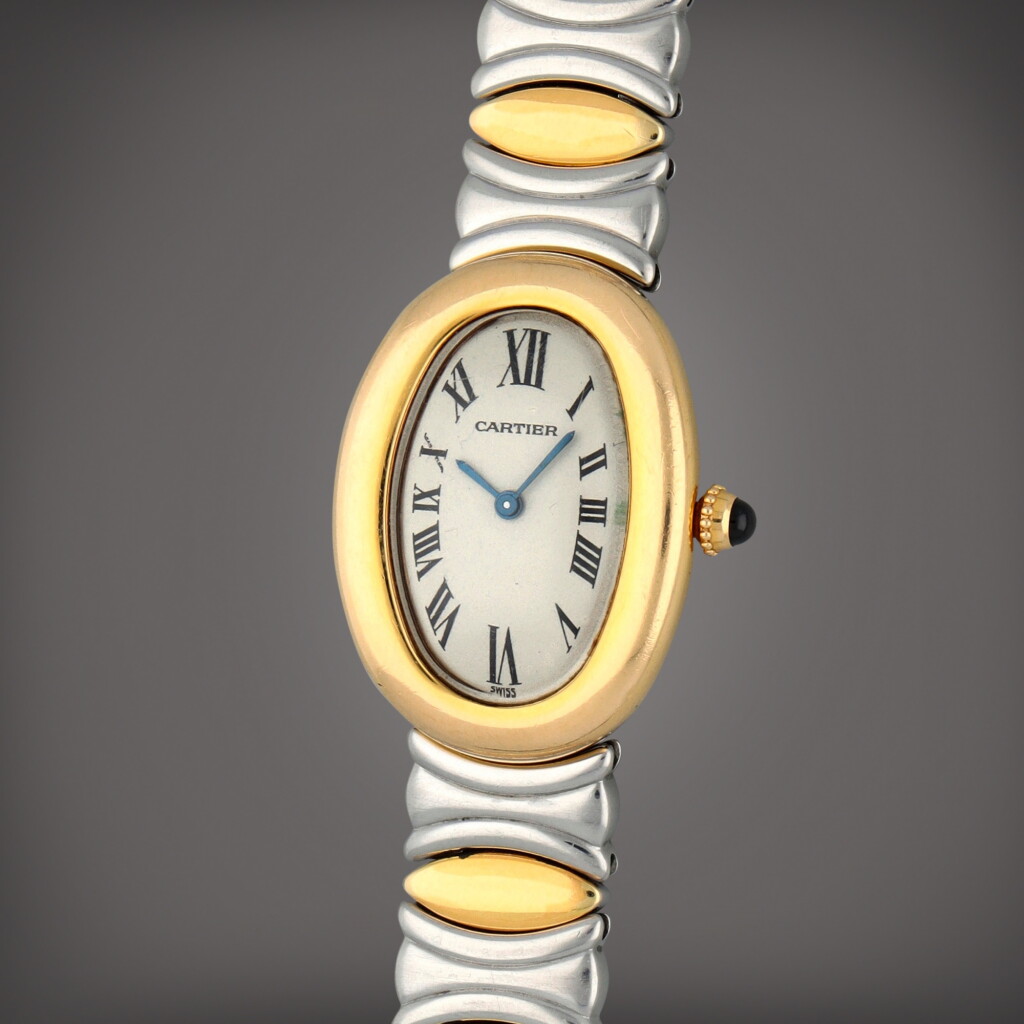 View full screen - View 1 of Lot 460. Baignoire | A yellow gold and stainless steel wristwatch | Circa 1995.