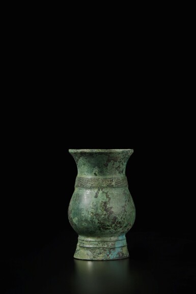View full screen - View 1 of Lot 267. An archaic bronze ritual wine vessel (Zhi), Western Zhou dynasty | 西周 青銅獸面紋觶.