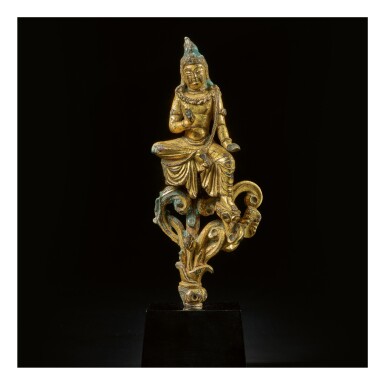 View full screen - View 1 of Lot 590. A GILT-BRONZE FIGURE OF A SEATED BODHISATTVA, TANG DYNASTY.