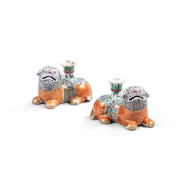View full screen - View 1 of Lot 729. A pair of famille-rose 'Buddhist lion' candle holders, Qing dynasty, 19th century.