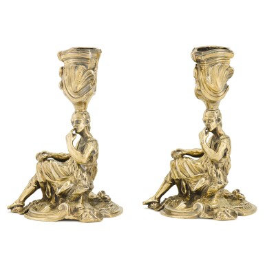View full screen - View 1 of Lot 54. Two silver-gilt candlesticks, one unmarked, the other Robert Garrard, London, 1840 | Deux flambeaux en vermeil, un non poinçonné, l'autre par Robert Garrard, Londres, 1840.