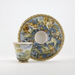 A Castelli maiolica cup attributed to Carlo Antonio Grue, with a trembleuse stand from the Grue family workshop, 1700 - 1715 circa