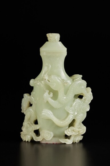 View full screen - View 1 of Lot 203. A pale celadon jade 'dragon' vase and cover, Qing dynasty, 18th century | 清十八世紀 青白玉雕雙龍戲珠紋蓋瓶.