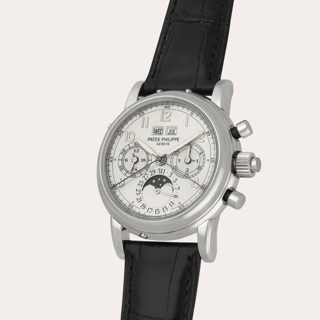 View full screen - View 1 of Lot 99. Reference 5004P-021 | A platinum perpetual calendar split-second chronograph wristwatch with moon phases, 24-hour and leap year indication | Circa 1998.