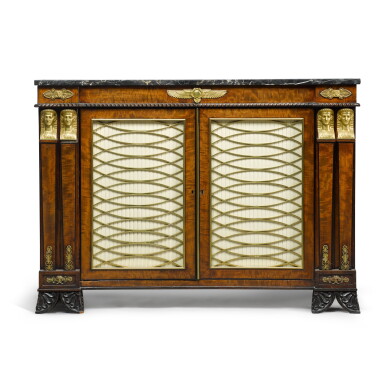 View full screen - View 1 of Lot 215. A Regency mahogany, ebony-strung and gilt metal-mounted side cabinet, early 19th century.
