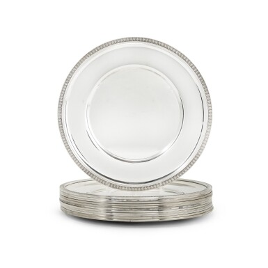 View full screen - View 1 of Lot 87. Twelve continental silver second course dishes or underplates, maker's mark a ship's wheel and standard 800, 20th century.
