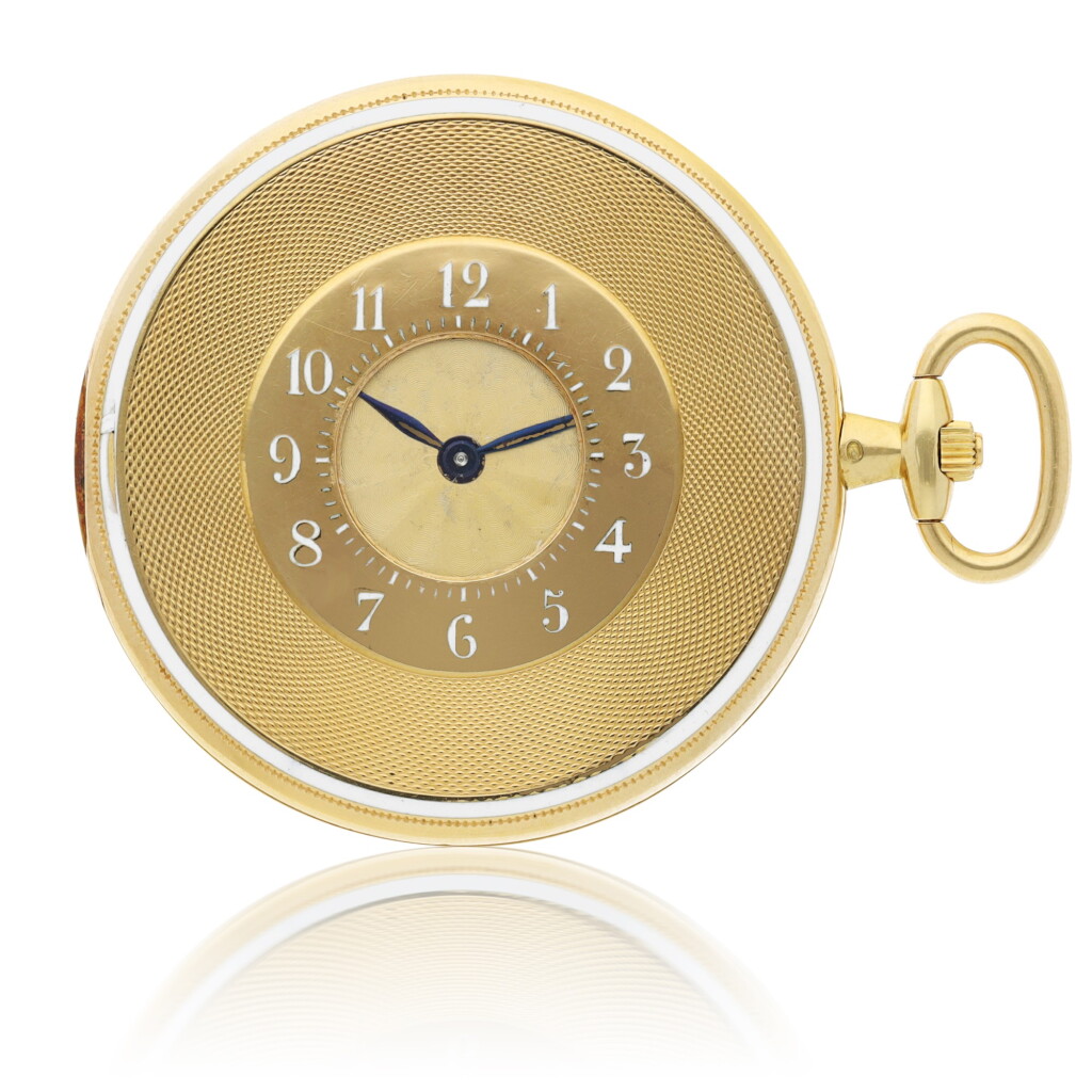 View full screen - View 1 of Lot 173. CARTIER | A YELLOW GOLD AND ENAMEL DEMI-HUNTING CASED WATCH, CIRCA 1920.